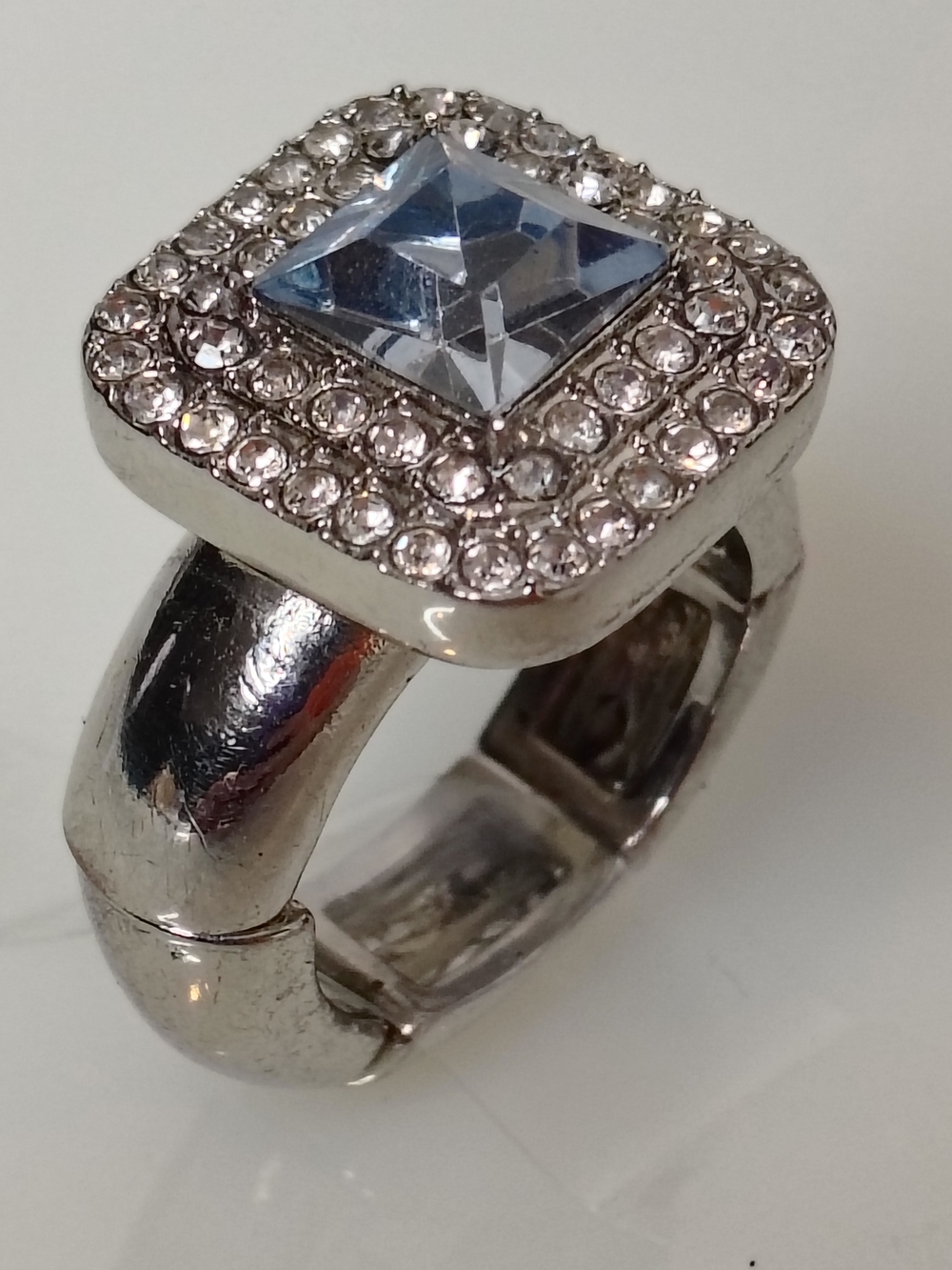 Elegant Silver-Tone Square Halo Ring with Light Blue Center Stone